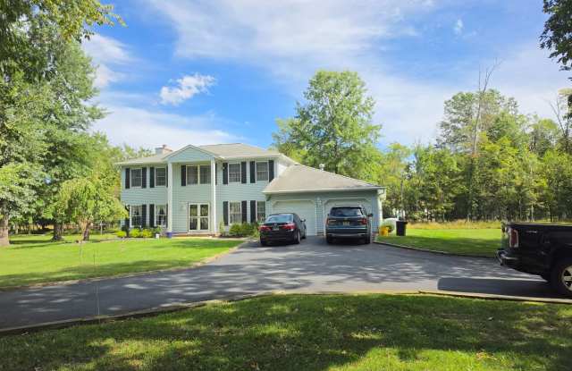 Centrally located, 4/5 spacious bedroom, 2.5 bathrooms, 2-car garage single family home with huge yard & lots of off-street parking! Gallery 1