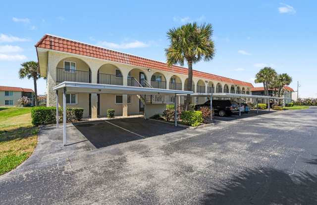 Must see 1st floor, corner unit in St Lucie Gardens. photos photos