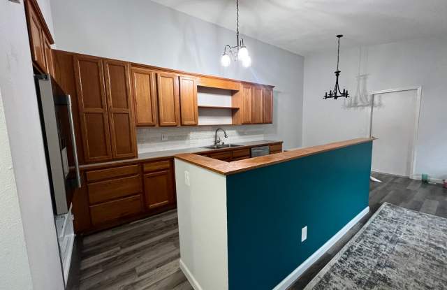Updated ranch style townhome with open concept layout and vaulted ceilings Gallery 3