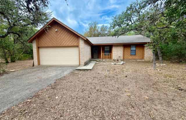 Quiet Wooded 3/2 with Garage and Fenced Yard Gallery 1