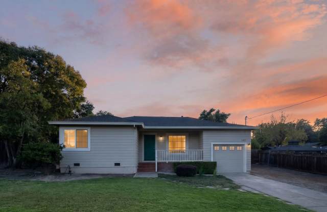 Adorable 2 Bedroom, 1 Bathroom Single Level Single Family Home with Attached Garage, Laundry and Yard! photos photos