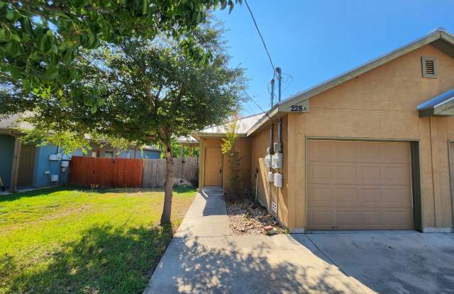 3/2/1 Duplex w/ Stained Concrete Floors Throughout! Refrigerator Included /Fenced in Yard / CISD photos photos