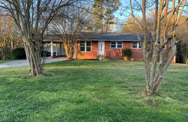 3 bedroom & office -2 baths -2 car carport - washer/dryer hook ups - Den and formal living room- formal dining room photos photos