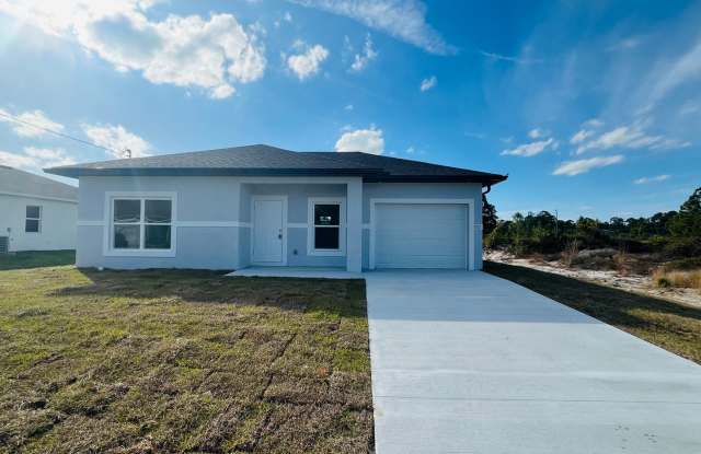 Brand-New Modern 2BR/2BA Home with Garage on Oversized Lot – Prime SW Lehigh Acres Location photos photos