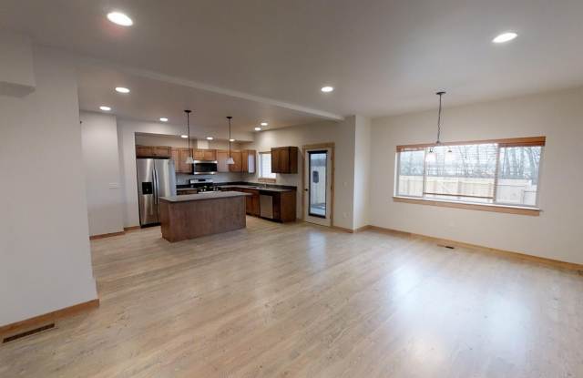 Spacious Townhome with Central Heat/Air - Two Car Garage, Fenced in Backyard! **EARLY BIRD PRICING - See details below** photos photos