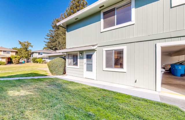 Lovely Two Bedroom One Bath Two Story Condo with Carport & Laundry Facility Gallery 3