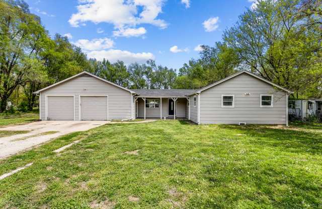 Beautifully remodeled home on over a 1/2 an acre of land with a HUGE 6 tandum car garage! photos photos
