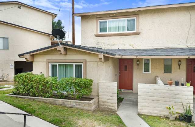 Priced to rent fast! Turn-key and Move-in Ready 2 Bedroom, 1.5 Bath Two-Story Corner-Lot Townhouse! Gallery 1