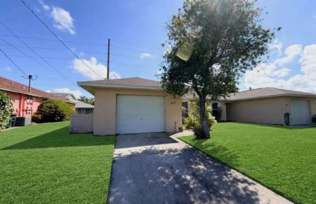 FIRST MONTH RENT FREE! 2/2 Duplex with Garage NE Cape! Gallery 1