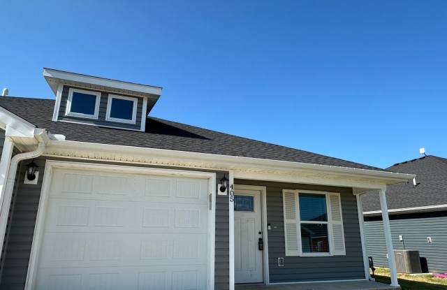 MOVE IN SPECIAL: FIRST MONTH FREE!! Newly built 3 bedroom, 2 bathroom duplex with a one car garage and open layout in Duenweg! photos photos
