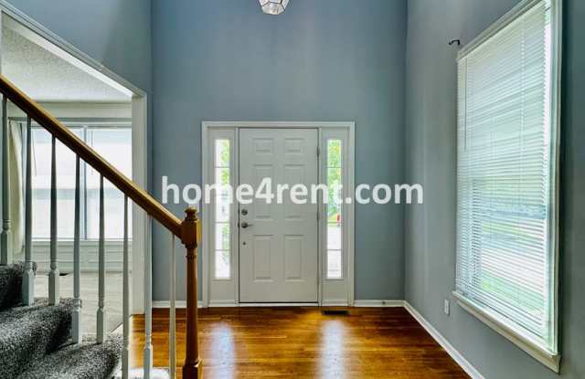 Spacious, 2 Story Home in Blue Valley Schools w/ Updated Kitchen, Fenced Yard, and a Finished Basement! Gallery 3
