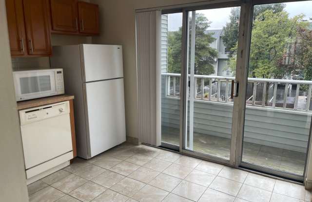 1 FREE MONTH Modern Duplex with Pool, Parking, 2 balconies and 1 deck, Large Bedrooms,1.5 bath Laundry inside Gallery 3