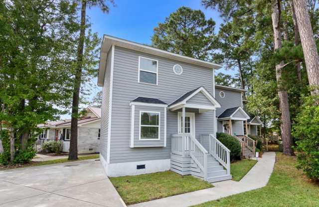 End unit of a Triplex within walking distance to beach photos photos
