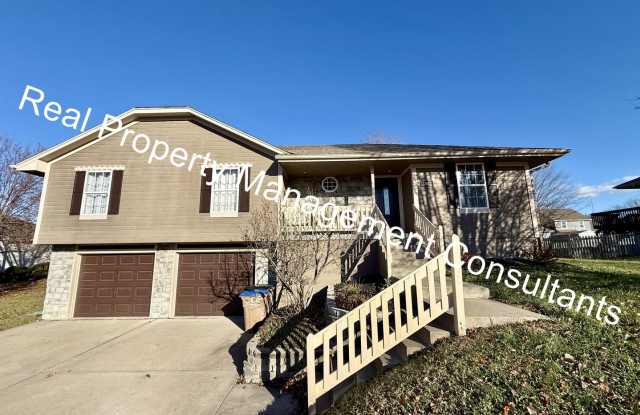 4 Bedroom with Flexible Living Space! Deposit Free Living Available via Obligo - 1003 Redwood Drive, Raymore, MO 64083