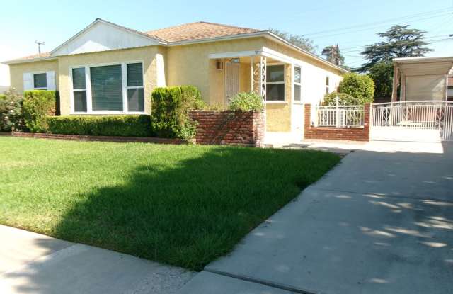 Charming 3-bedroom, 2-bath home in Bellflower photos photos