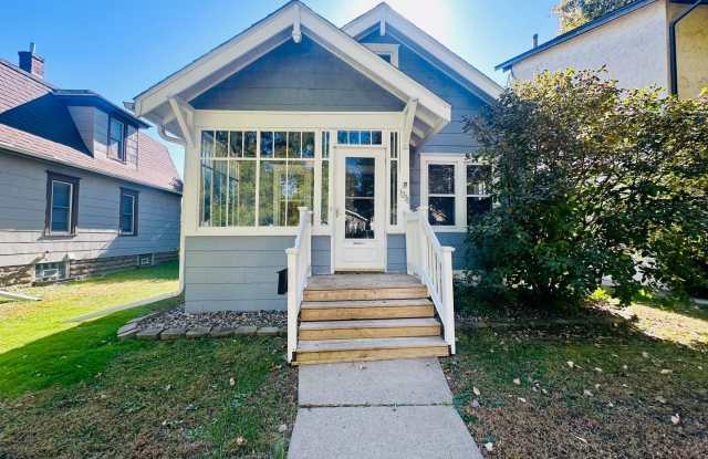 Charming 2-Bedroom Home with Hardwood Floors  Detached Garage! photos photos