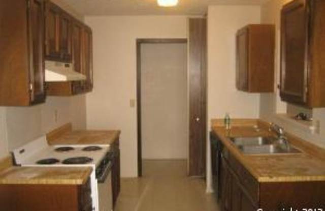 SPACIOUS HOME W/ CONVERTED GARAGE ADDS EXTRA LIVING *FIREPLACE*STOVE/RANGE AND DISHWASHER*CENTRAL HVAC Gallery 2