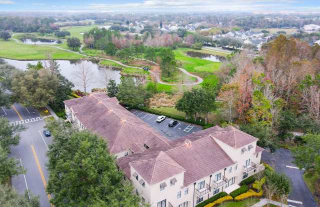Iconic 2 story corner condo at the Terraces of Celebration. Completely renovated 2 Bedroom, 2 Bathroom with second floor Loft and wrap around balcony overlooking the Lake Gallery 3