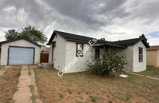 Updated and spacious 2 bedroom/1 bathroom house with detached 1 car garage. Granite countertops, Central Heat/A/C, and large fenced backyard! photos photos