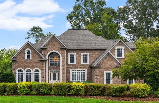 Stunning 4 bed, 4.5 bath Custom home in Carolina Coves of Lake Wylie with a water view! photos photos