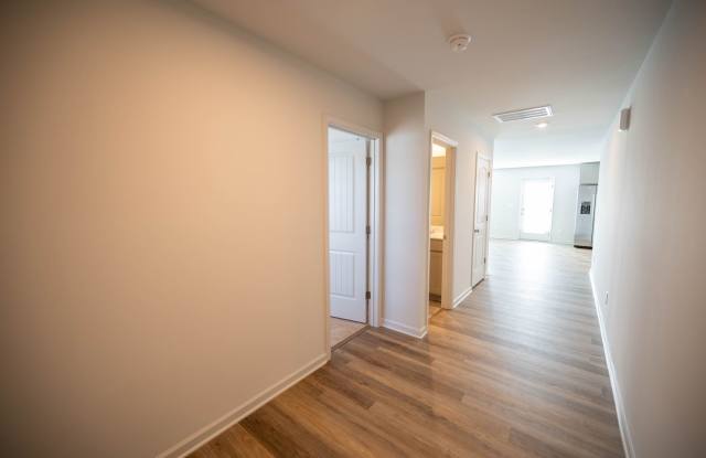 Brand new 4-bedroom / 3 Bath with a main-level guest suite in the sought after Barbour Farms community! **Free 1st Months Rent!!** Gallery 4