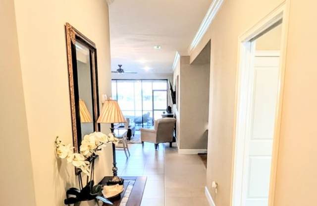 Short term turnkey furnished Incredible 2/2 with den ground floor condo in resort Esplanade Lakewood Ranch Gallery 4