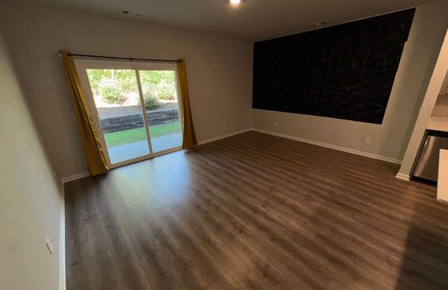FOR LEASE- Townhome Nestled on a quiet dead-end road, perfect for those seeking privacy and peaceful surroundings. Gallery 4
