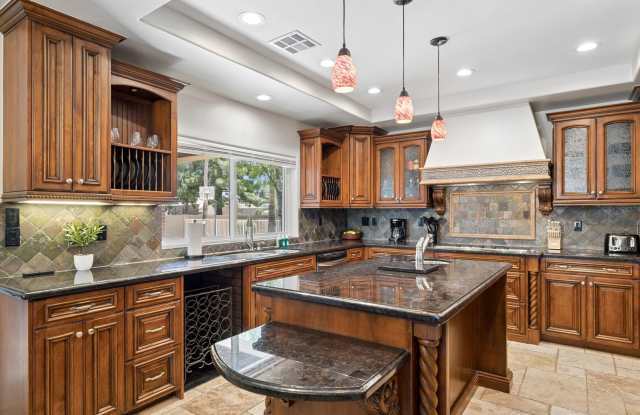 Furnished Custom HOME ready to move in with No HOA!!  Property is like living at a resort!!  The backyard is stunning with custom landscaping, Pool, Faux grass, BBQ and Fireplace!!!  So many amenities with this Stunner!!!!  Available NOW!!!  Lake Pleasant photos photos
