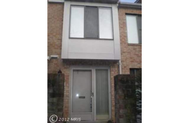 RENOVATED 2 LEVEL TOWNHOUSE WITH UPDATED KITCHEN AND BATHROOM photos photos