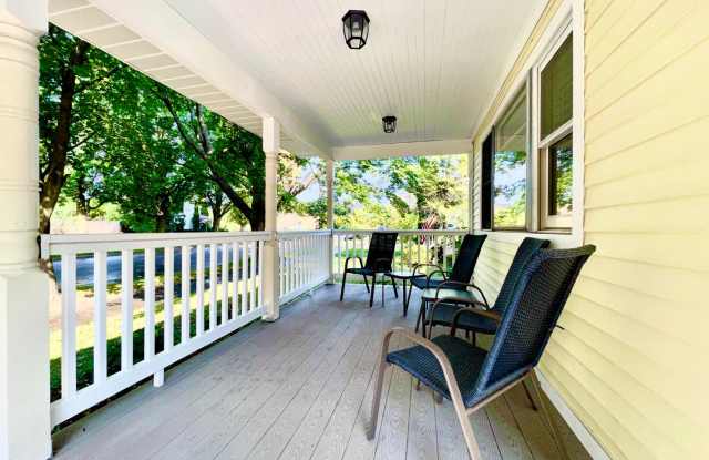 *Available August 2025* Welcome to "The Yellow Porch" – A Charming Home in the Heart of Traverse City photos photos