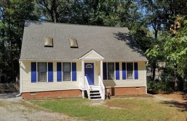 Traditional cape cod in Ashton Woods Subdivision photos photos