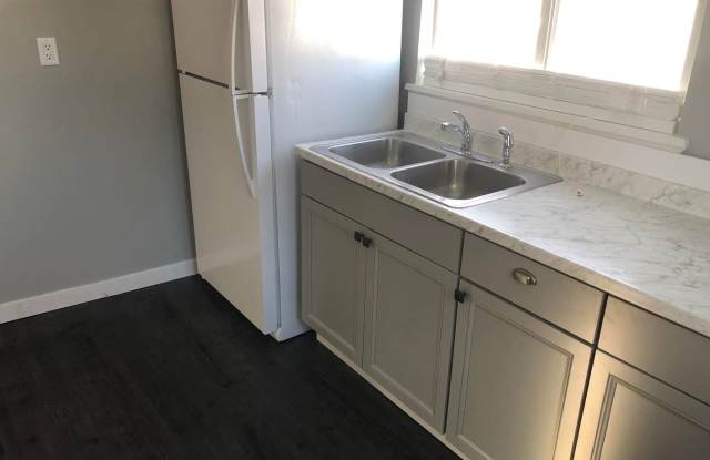 Charming 1 bed, 1 bath home featuring a fenced yard photos photos