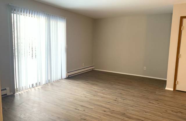 Come check out this spacious two bedroom apartment with newer flooring throughout! Gallery 4