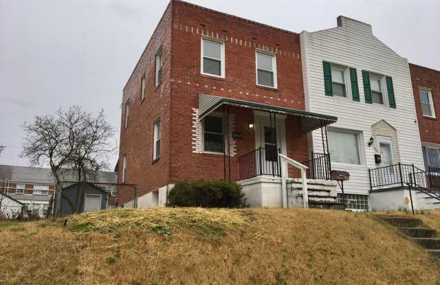 Fantastic 3 Bedroom EOG Townhome with Parking Pad in Parkville! photos photos