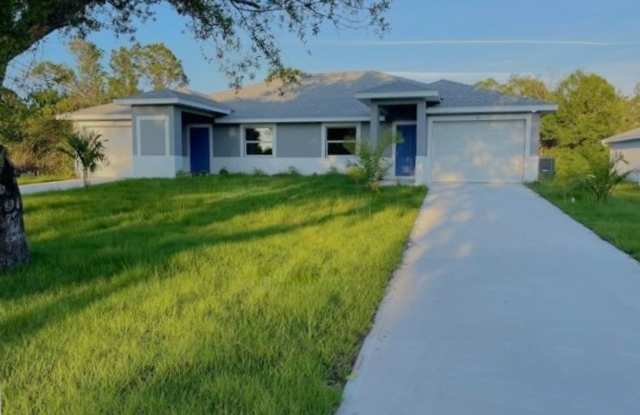 2/2/1+DEN - GREAT LOCATION IN LEHIGH ACRES- BELL BLVD photos photos
