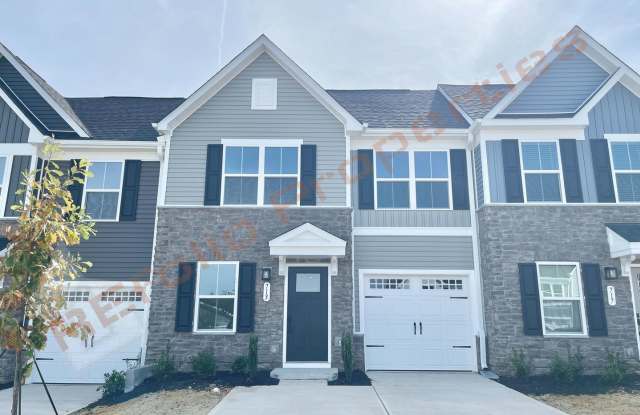 Beautiful 3 Bedroom, 2.5 Bath Townhome with First-Floor Primary Suite and 2 Parking Space in Rollman Farms, Raleigh, Available Now! photos photos