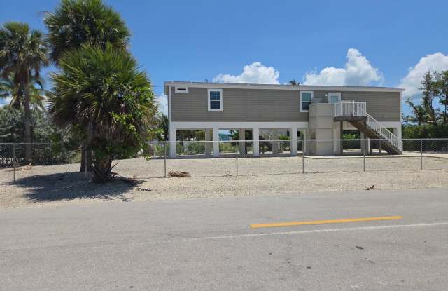 Centrally-Located 2-Bed/2-Bath Home, full perimeter fence with Canal Access photos photos