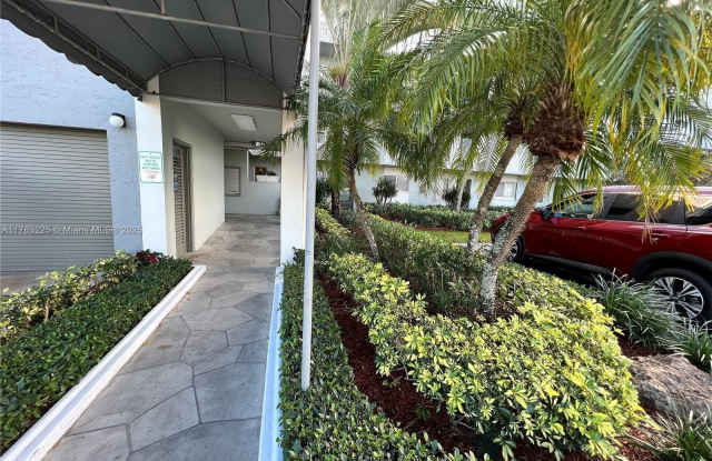 2220 N Cypress Bend Dr - 2220 North Cypress Bend Drive, Pompano Beach, FL 33069