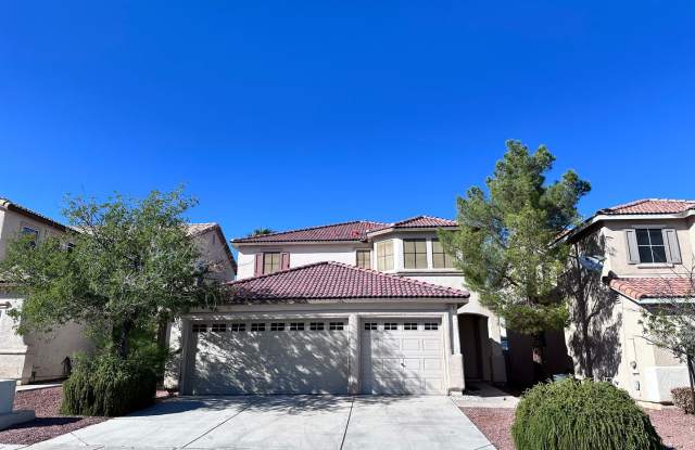 Welcome to this beautifully maintained two-story home offering 4 spacious bedrooms and 3 full bathrooms, including a convenient downstairs bedroom with its own shower—ideal for guests or multi-generational living. - 9676 Ridgebluff Avenue, Spring Valley, NV 89148