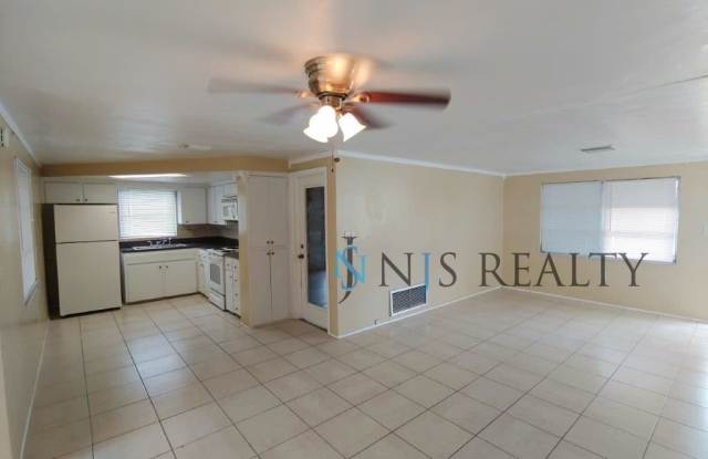 JUST REDUCED!!  Beautiful 2/2/1 1150 Sq. Ft. with BONUS ROOM!!... tile & luxury plank flooring, Frest paint and a large fenced in yard! Gallery 4