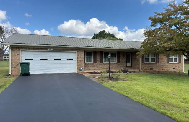 Spacious three bedroom, two bathroom with covered back porch and detached garage located on Cave Mill rd photos photos