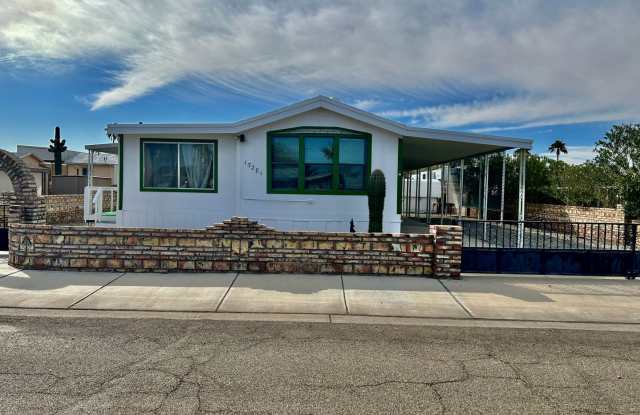 Remodeled Single Wide Mobile Home with Enclosed Patio - 13281 East 50th Drive, Fortuna Foothills, AZ 85367