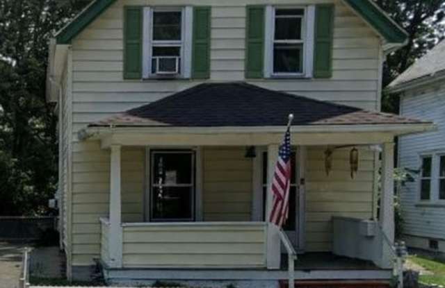 Spacious Rochester 3-Bedroom Home with Enclosed Porch + Backyard photos photos