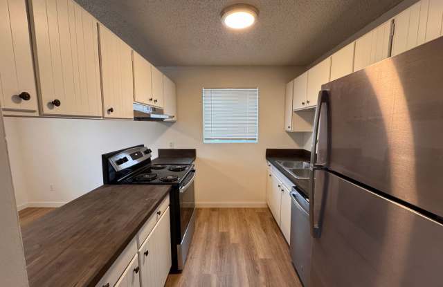 Spacious 1-Bedroom Apartment for Rent in Millwood Spokane Valley - Updated Unit with A/C, Stainless Appliances, and Covered Parking at 9021 E Liberty Ave photos photos