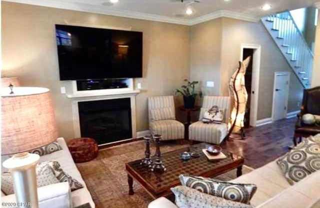 WATERFRONT W/BOAT SLIP!!!! This beautiful home is located in a gated community on North Lagoon Drive. photos photos