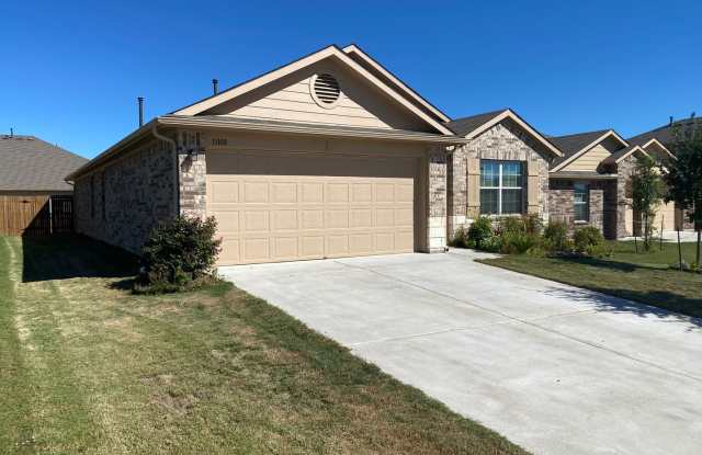 Three Bedroom, Two Bath, Two Car Garage, Washer and Dryer are included. - 11108 Pack Wagon Trail, Travis County, TX 78754