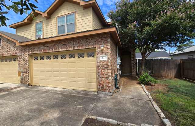 3/2.5/2 Duplex / Laundry on 1st Floor (Inside) / Wood Like Tile Flooring / Fenced in Yard / CISD photos photos