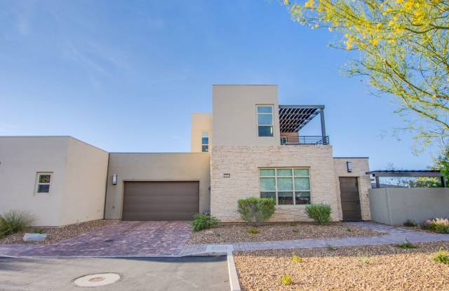 Absolutely gorgeous 2 bedroom 3.5 bathroom townhome with den in prestigious 55+ Trilogy community in Summerlin! photos photos