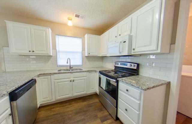 East Side Townhome + Granite Countertops + Attached Garage! Available August 22nd! photos photos