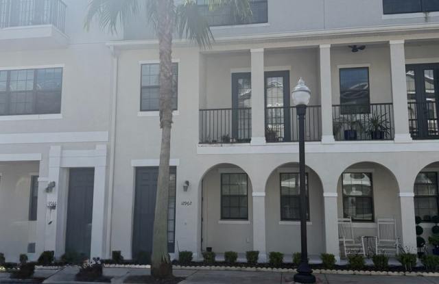 Coming Soon! Stunning 3-Story Townhome with 2-Car Garage in the Heart of Avalon Park! photos photos